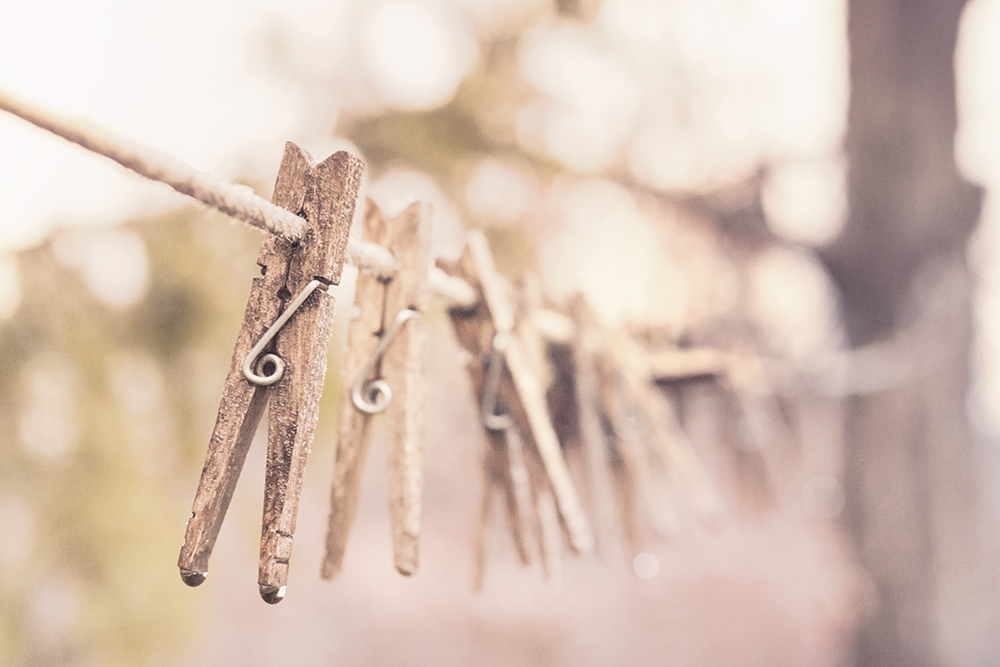 Wooden pins on a clothesline